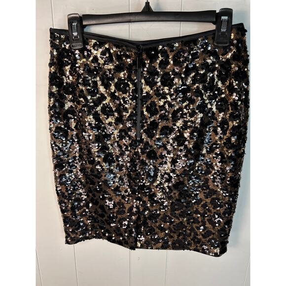 Cache sequin mini skirt with a leopard print. Gold and Black. Size 2 - Picture 2 of 4